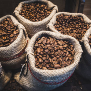 coffee beans in bags. fresh coffee beans background.